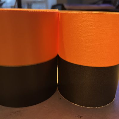 Rouwlint SuperSatin 100 MM zwart - oranje Rol 25 meter